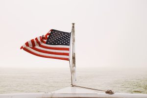 USA flag with voting ballot