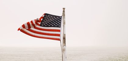 USA flag with voting ballot